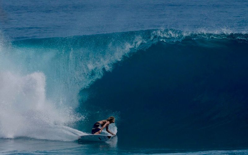 Surfer Oscar Langburne bottom turn surfing G-Land Indonesia - Australian free surfer Indo surf trip video | SEIKK Magazine